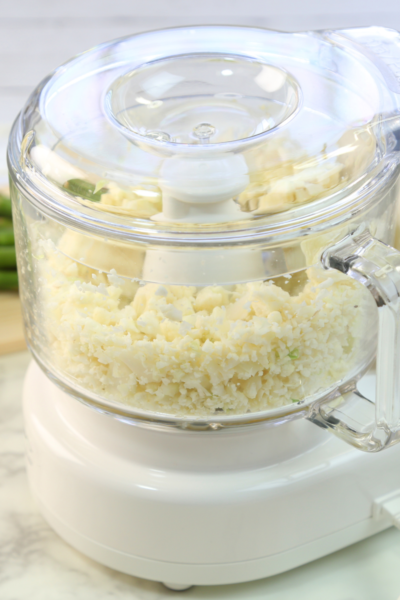 food processor chopping hard boiled eggs