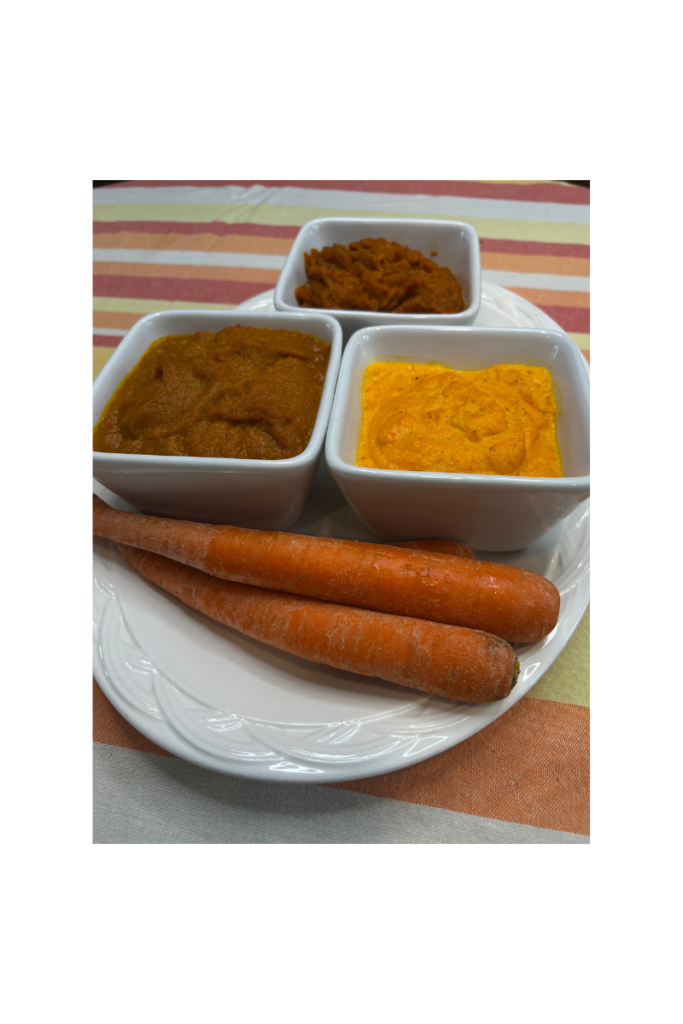 platter with whole carrots and three white dishes of three different puréed carrot recipes